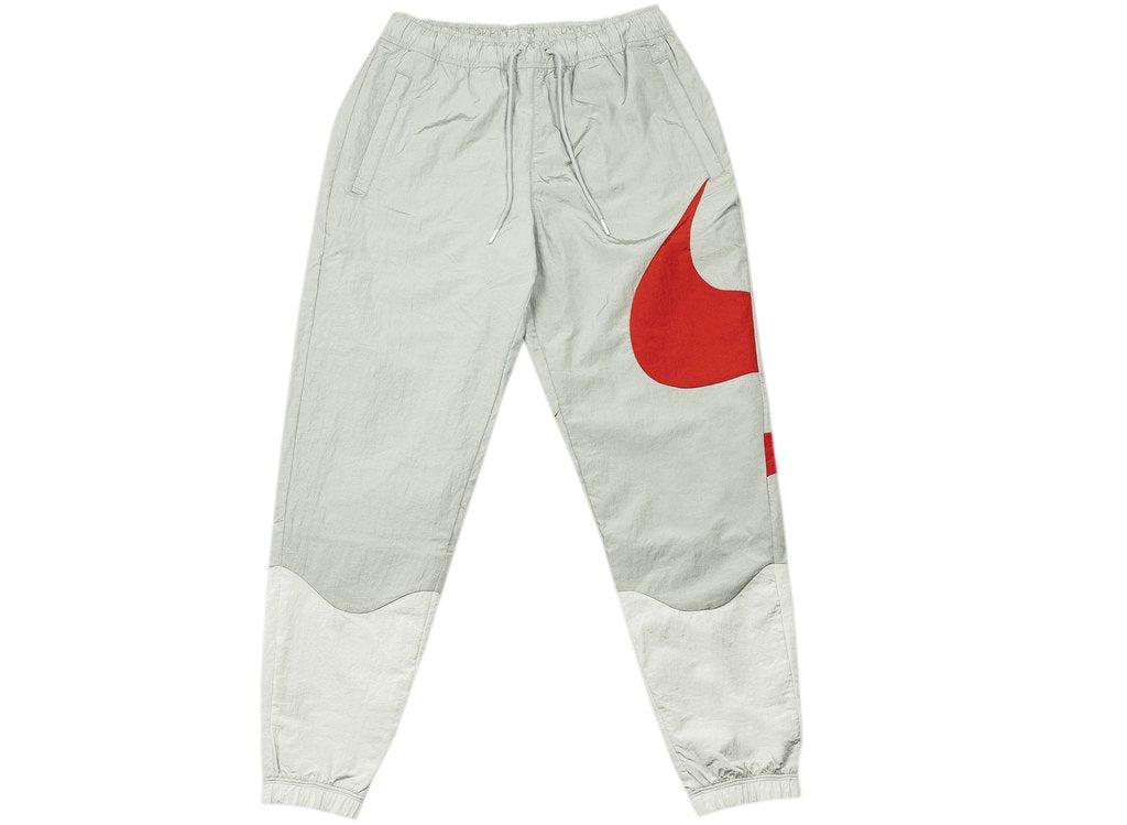 PANTALONE UOMO M NSW SWOOSH WVN LND PANT