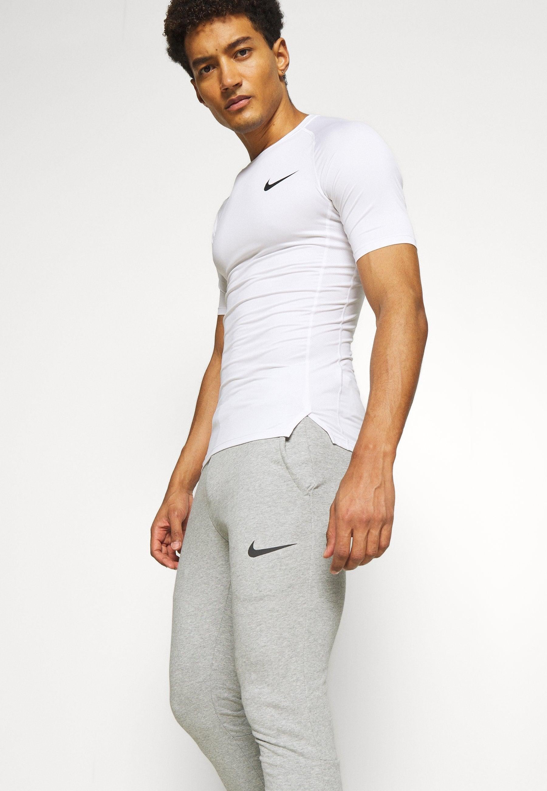PANTALONE NIKE CON POLSINO
