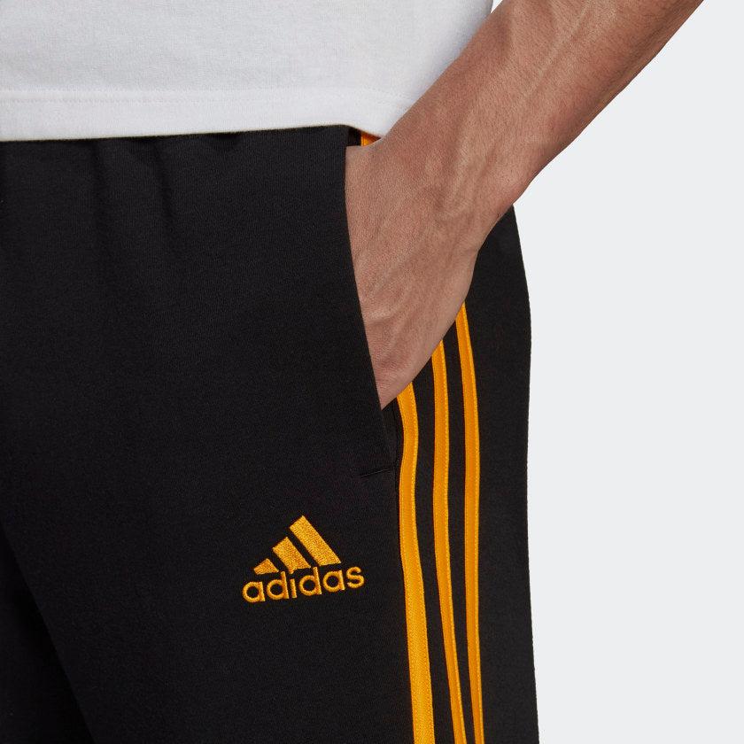 PANTALONI ESSENTIALS FRENCH TERRY CON POLSINI AFFUSOLATI E 3 STRISCE - Azzollino