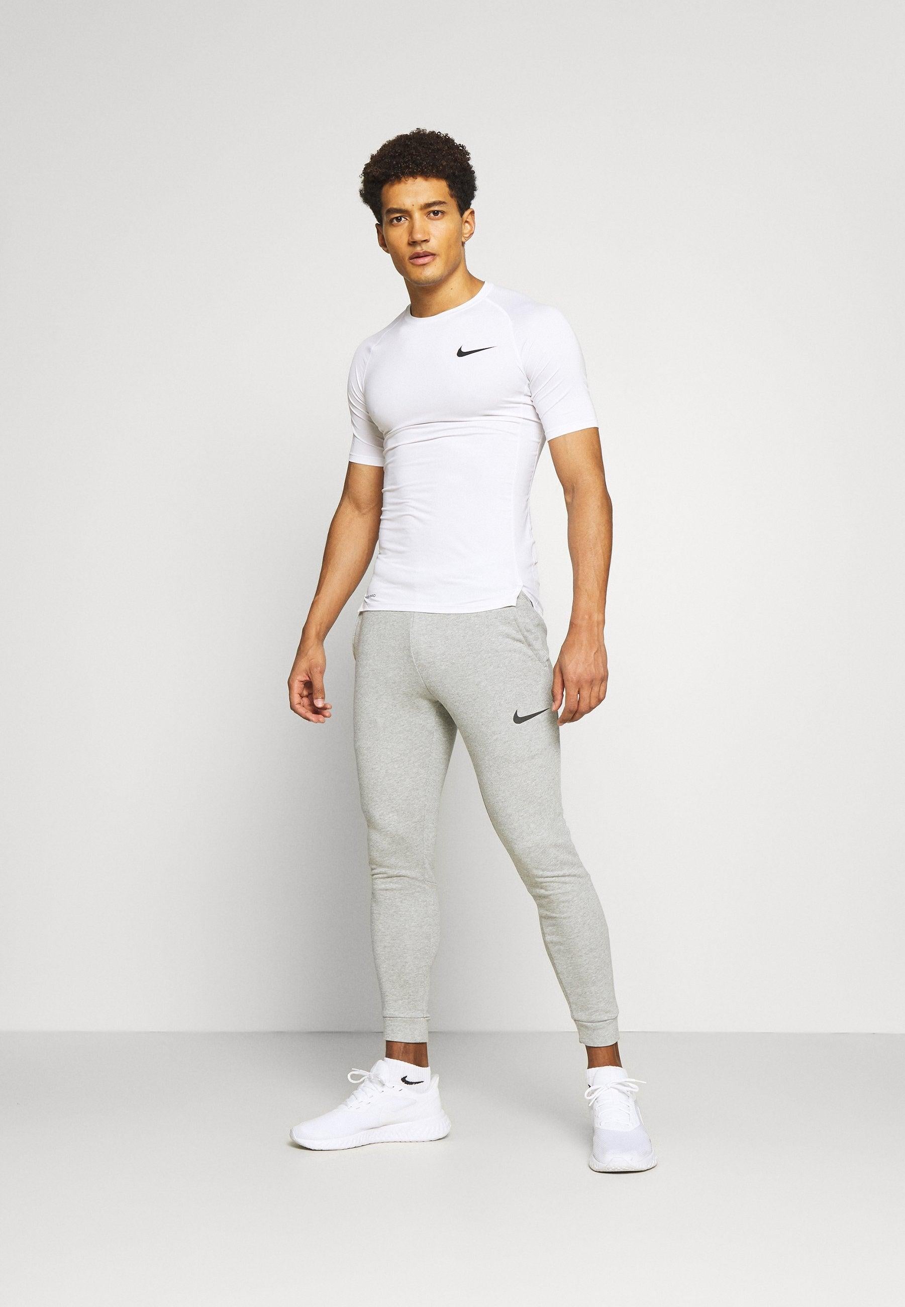 PANTALONE NIKE CON POLSINO