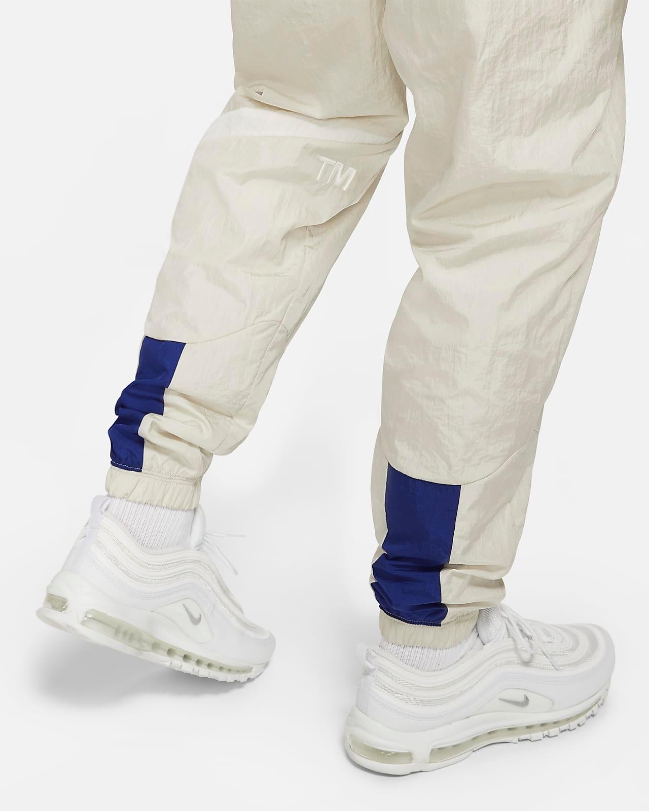 PANTALONE UOMO M NSW SWOOSH  WVN LND PANT  