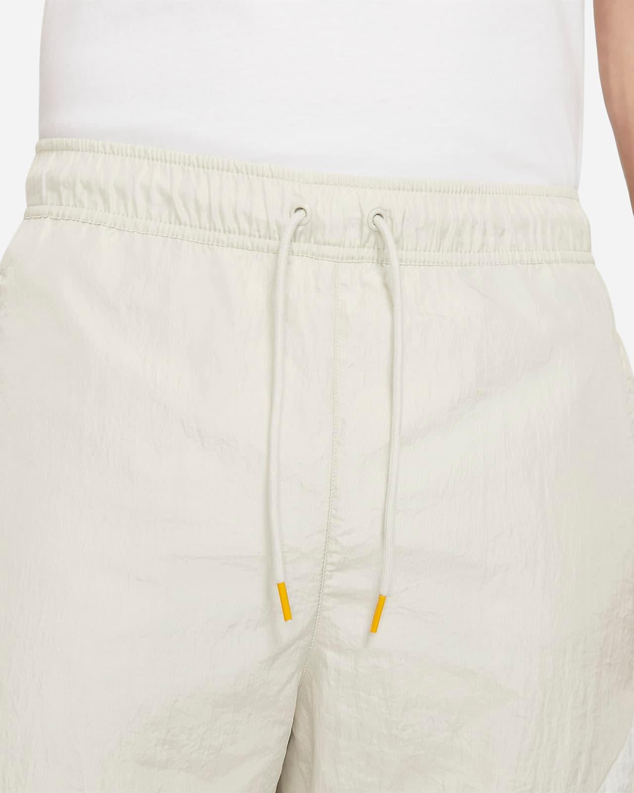 PANTALONE UOMO M NSW SWOOSH  WVN LND PANT  